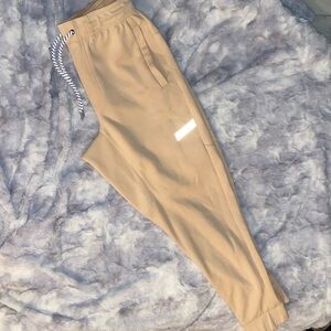 Legends light orange joggers